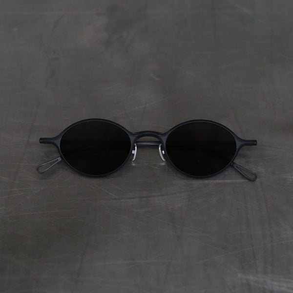 Rigards titanium oval thin frame glasses RG1039TI series collection RG-RG1039TI-HKSH black frame dark gray lenses